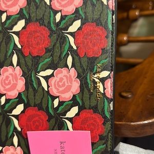 Brand new with tags Kate Spade clutch in garden print